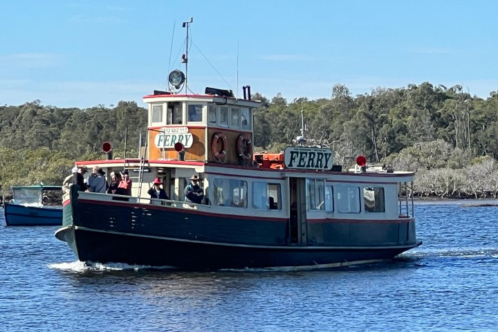 a small boat in a large body of water