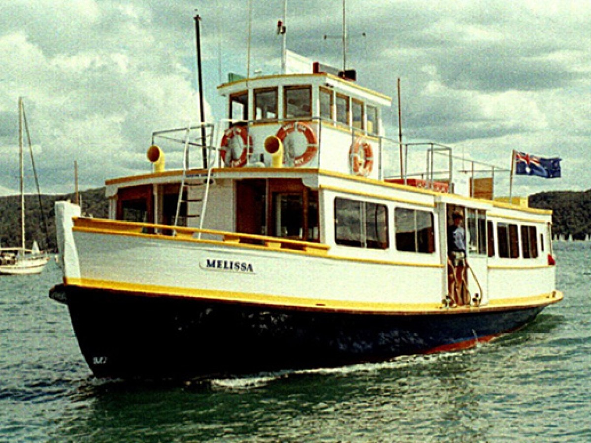 a small boat in a large body of water