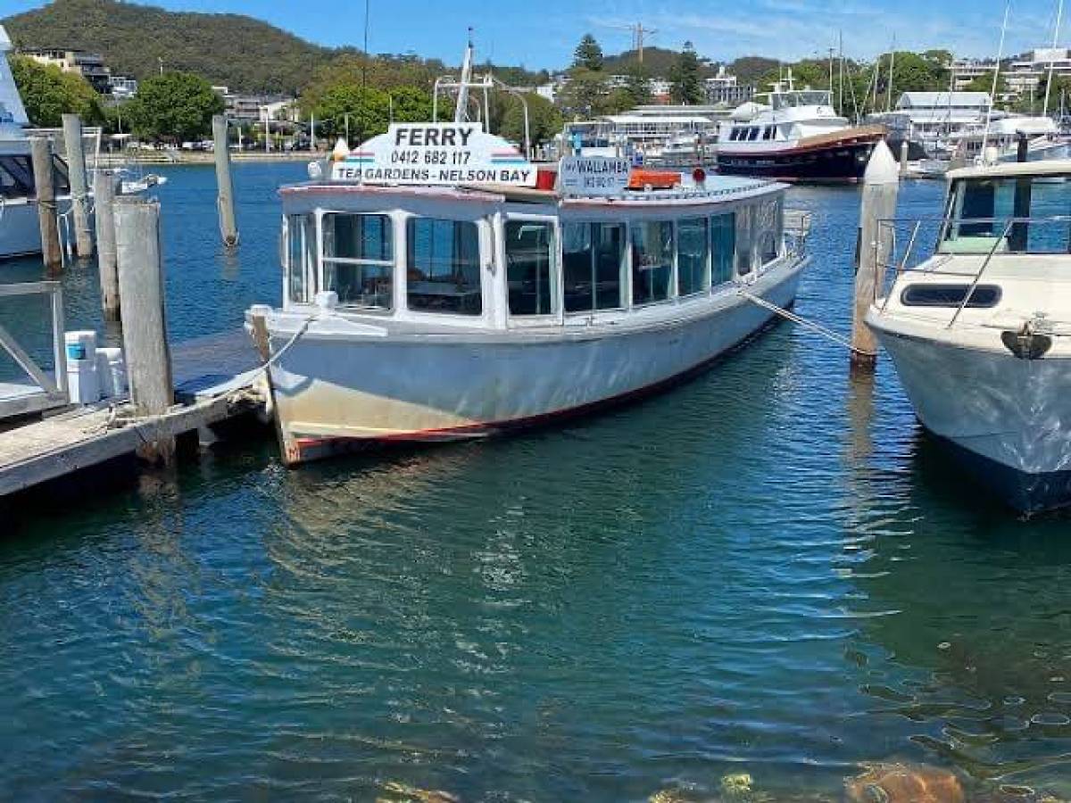 a boat is docked in a harbor